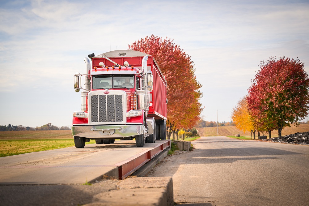 a WeighComp customer drives onto a scale at harvest